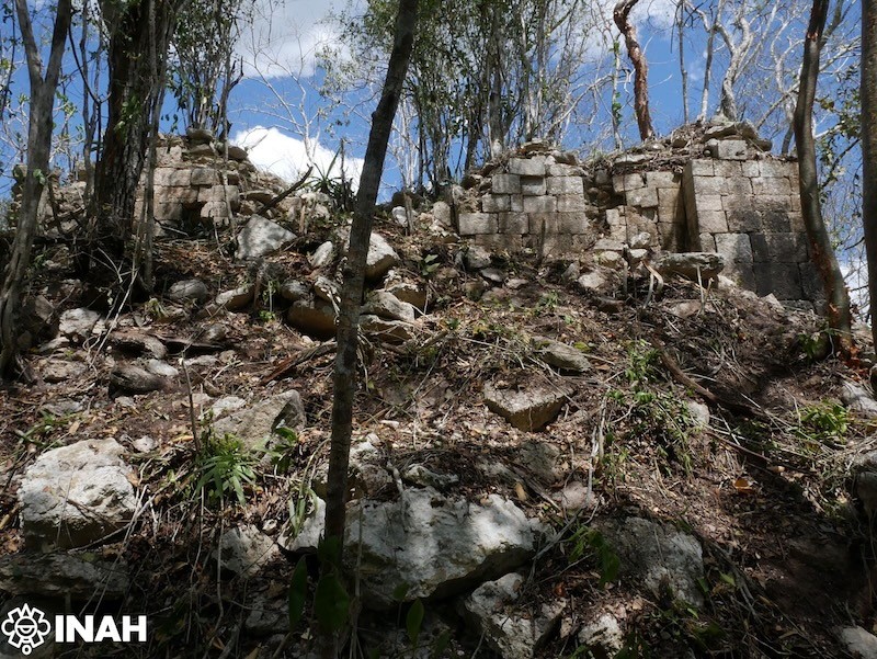 Stone ruins of Minanbé emerging through jungle canopy, Calakmul Biosphere Reserve, Campeche, Mexico
